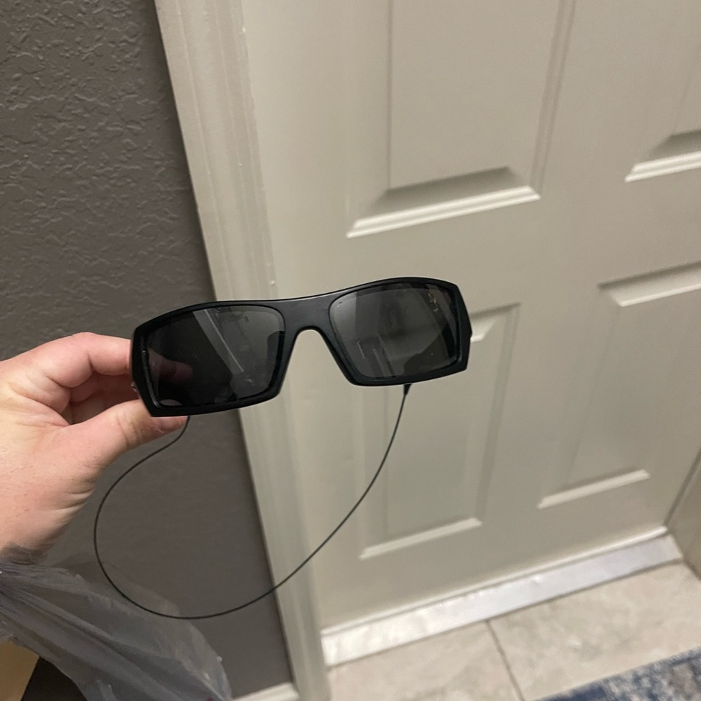 2 pair of polarized Oakley sunglasses